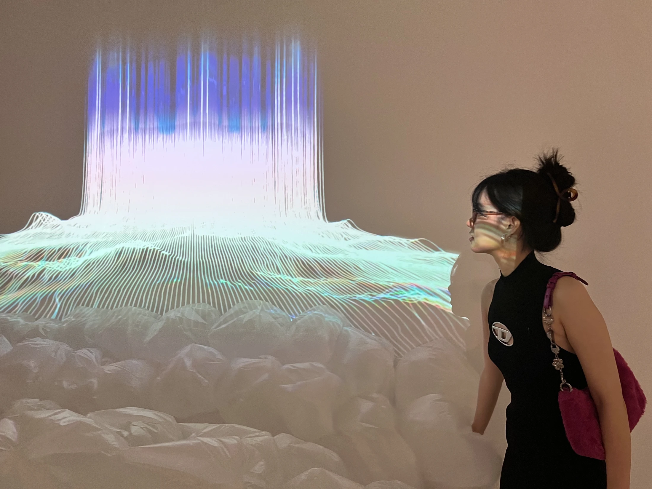 A visitor interacting with Sea Flower.